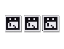 Three black and white pixelated icons on a white background